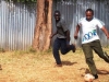 Playing football with mentees at vision africa